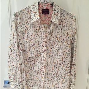 White shirt with whimsical birds and flower print